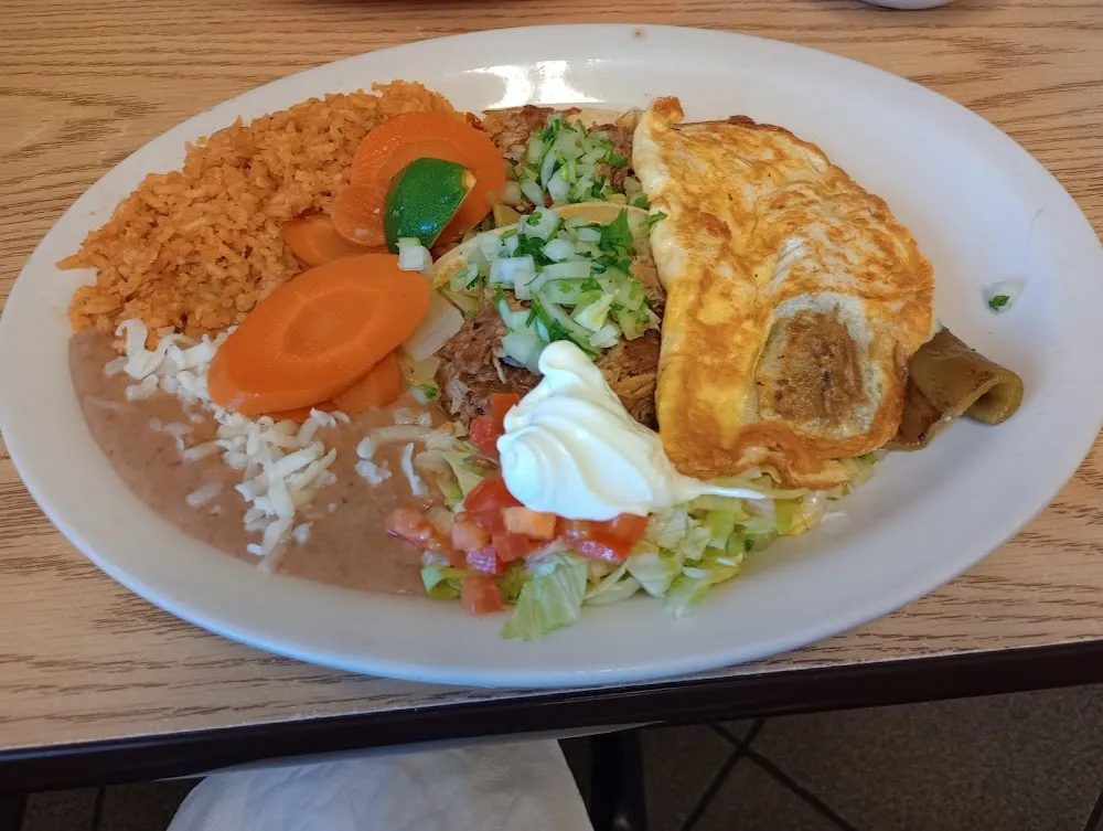 Pulled Pork Street Tacos with Extra Onion Lime and Cilantro and a Chili Relleno Ala Cart